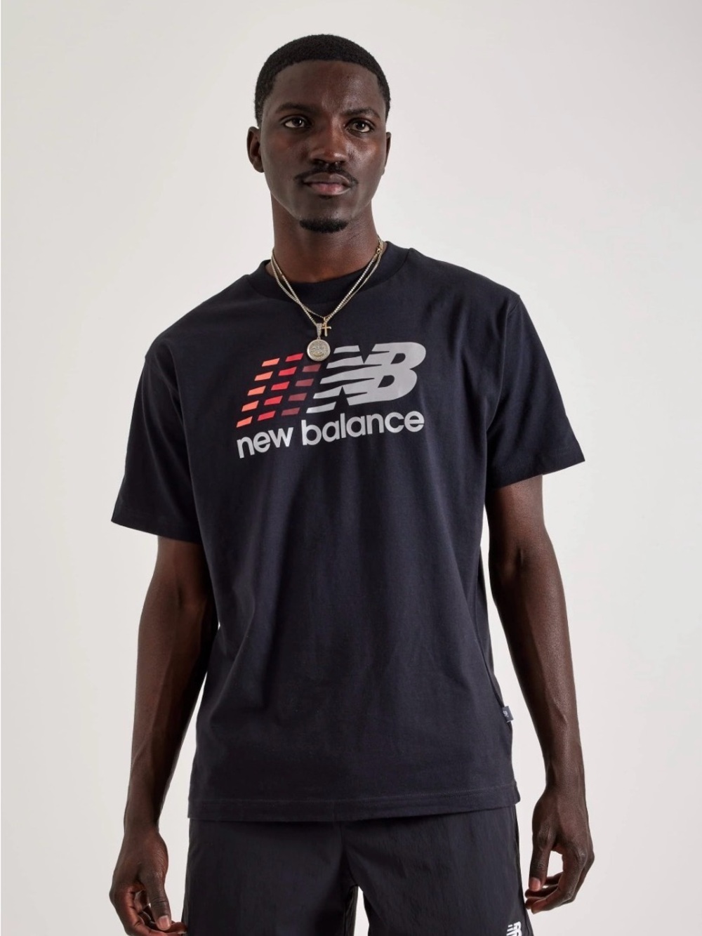 New Balance Black Short-Sleeve Logo Tee with Red Accent
